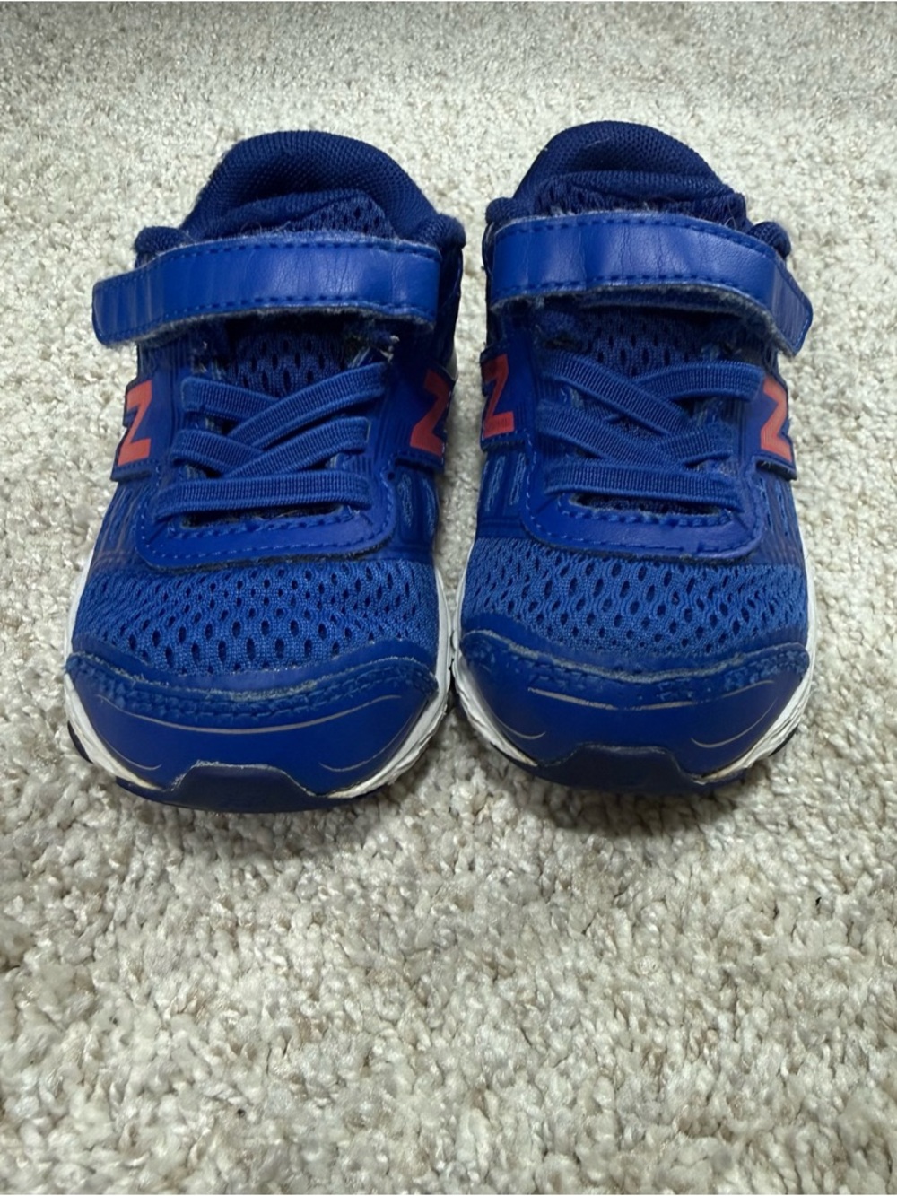 New Balance Blue Kids Sneakers with Pink Logo Accent
